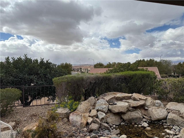 view of yard with fence