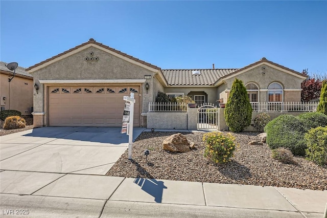 2715 Riceville Dr, Henderson, NV 89052 - view of front facade with stucco siding, a fenced front yard, driveway, a garage, and a tile roof