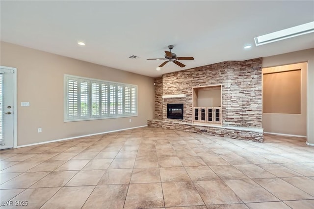 2715 Riceville Dr, Henderson, NV 89052 - unfurnished living room featuring a ceiling fan, light tile patterned flooring, recessed lighting, a fireplace, and baseboards