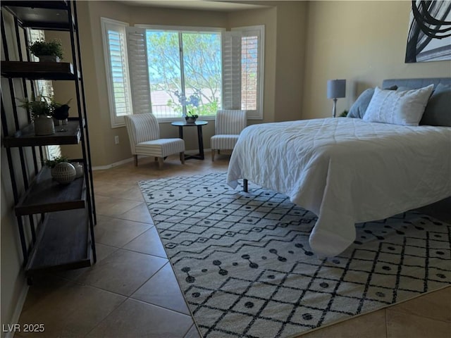 2715 Riceville Dr, Henderson, NV 89052 - bedroom featuring baseboards and tile patterned flooring