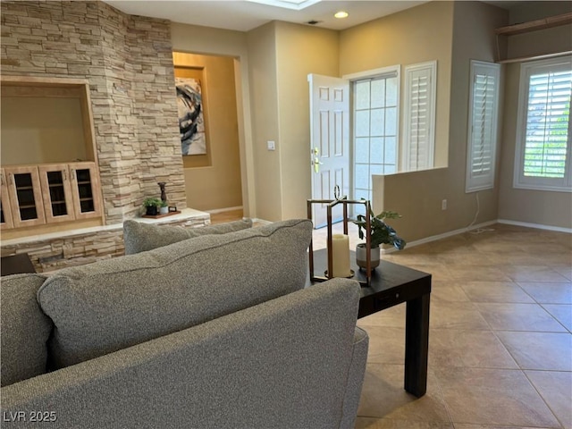 2715 Riceville Dr, Henderson, NV 89052 - living room featuring baseboards, tile patterned floors, and recessed lighting