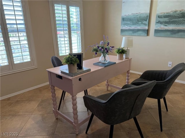 2715 Riceville Dr, Henderson, NV 89052 - home office with healthy amount of natural light, baseboards, and light tile patterned floors