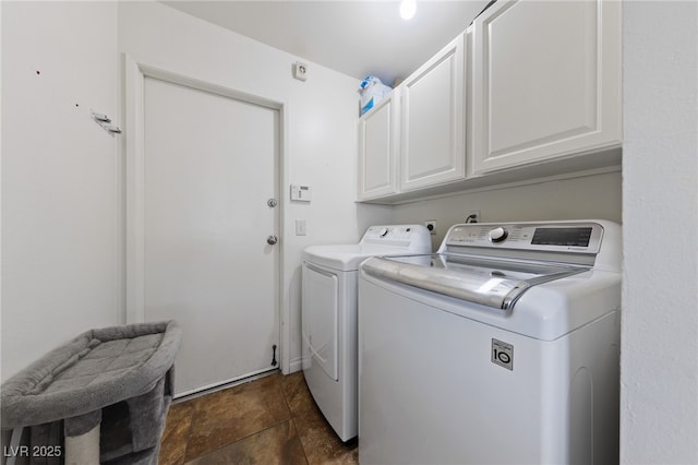 laundry room featuring cabinet space and washing machine and clothes dryer