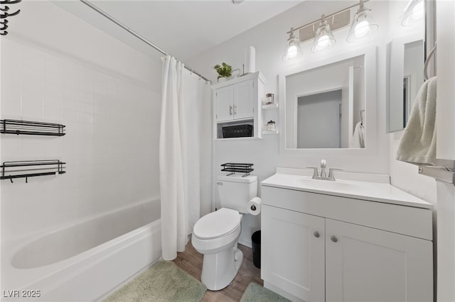 full bath featuring shower / bathtub combination with curtain, vanity, toilet, and wood finished floors