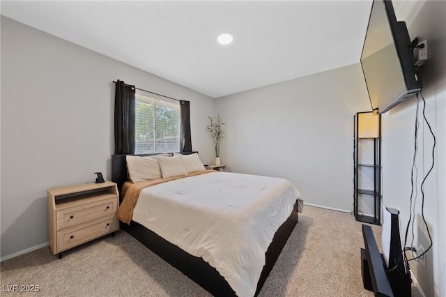 bedroom featuring baseboards, recessed lighting, and light colored carpet