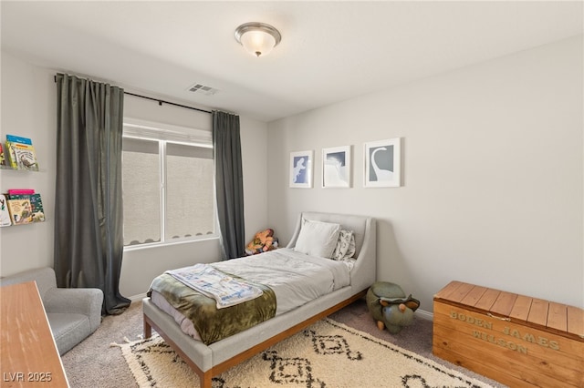 bedroom featuring carpet, visible vents, and baseboards