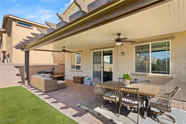 view of patio / terrace featuring outdoor dining area, outdoor lounge area, fence, and ceiling fan