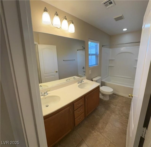 full bath featuring visible vents, a sink, and toilet