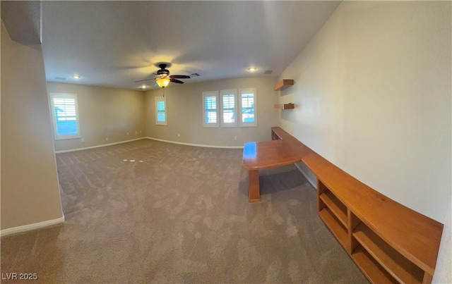 interior space featuring a ceiling fan, recessed lighting, carpet flooring, and baseboards