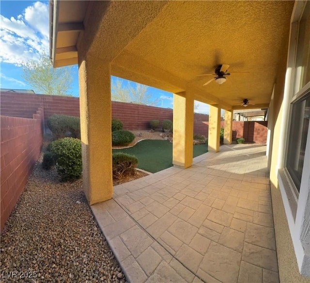 view of patio / terrace featuring ceiling fan and a fenced backyard