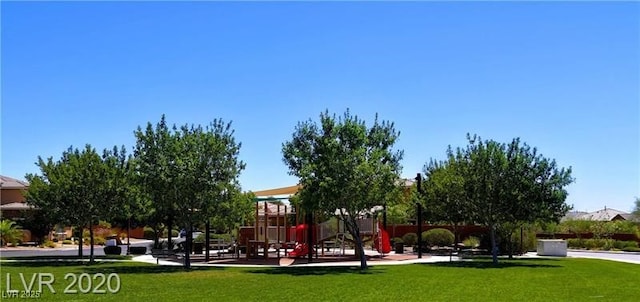 community playground featuring a yard