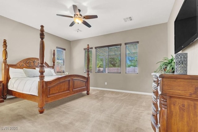 bedroom featuring light carpet, baseboards, visible vents, and ceiling fan