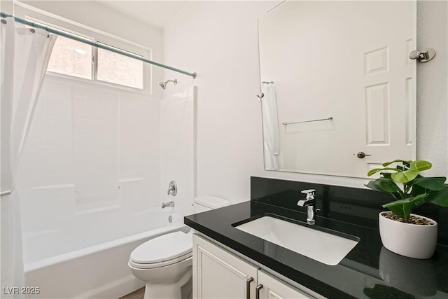 bathroom with toilet, shower / tub combo, and vanity