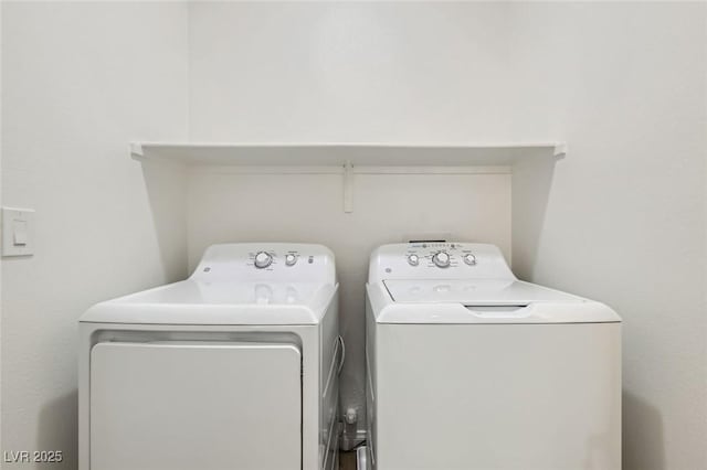 laundry room featuring laundry area and washing machine and clothes dryer