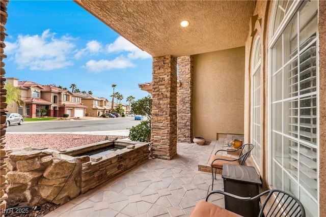 view of patio / terrace featuring a residential view