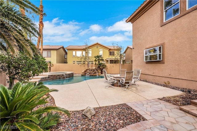 8925 Rio Verde Ave, Las Vegas, NV 89147 - view of patio with fence and a pool with connected hot tub