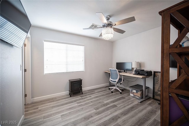 office area with ceiling fan, wood finished floors, and baseboards