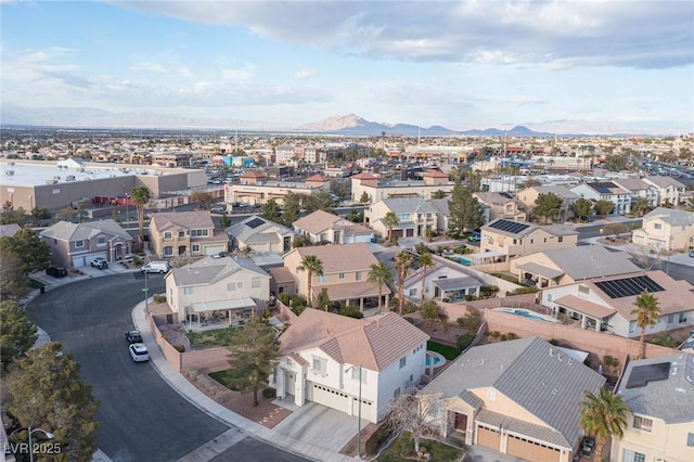 bird's eye view with a residential view and a mountain view