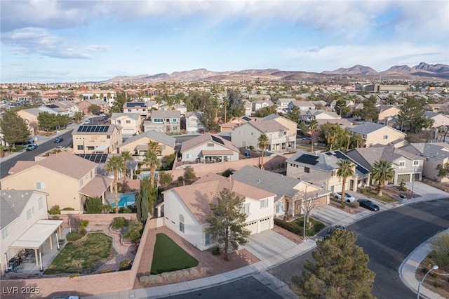 birds eye view of property featuring a residential view and a mountain view