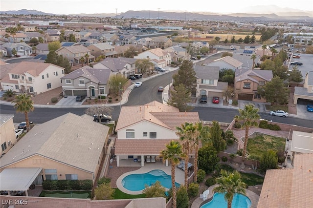 birds eye view of property featuring a residential view and a mountain view