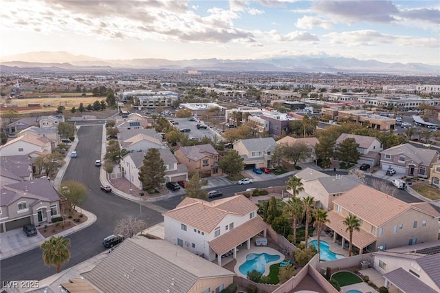 bird's eye view featuring a residential view and a mountain view