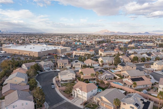 birds eye view of property with a residential view and a mountain view