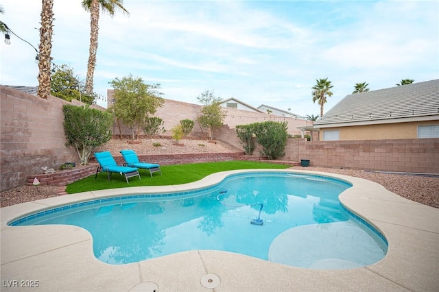 view of swimming pool featuring a fenced in pool and a fenced backyard