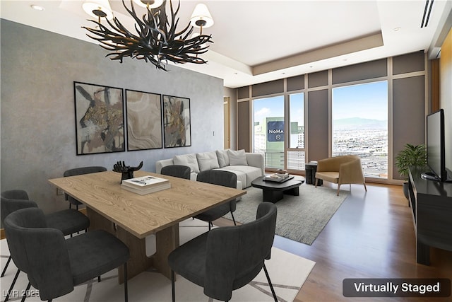 3750 Las Vegas Blvd Unit 2711, Las Vegas, NV 89158 - dining room featuring a chandelier, wood finished floors, and recessed lighting