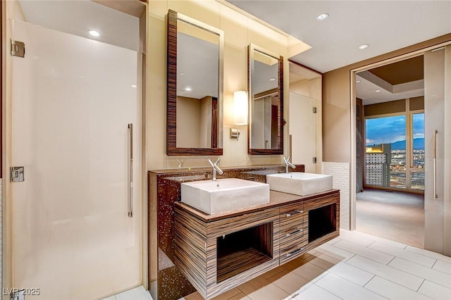 3750 Las Vegas Blvd Unit 2711, Las Vegas, NV 89158 - full bath featuring double vanity, tile patterned flooring, and recessed lighting