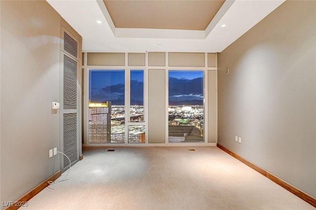 3750 Las Vegas Blvd Unit 2711, Las Vegas, NV 89158 - empty room with a tray ceiling, carpet floors, and recessed lighting