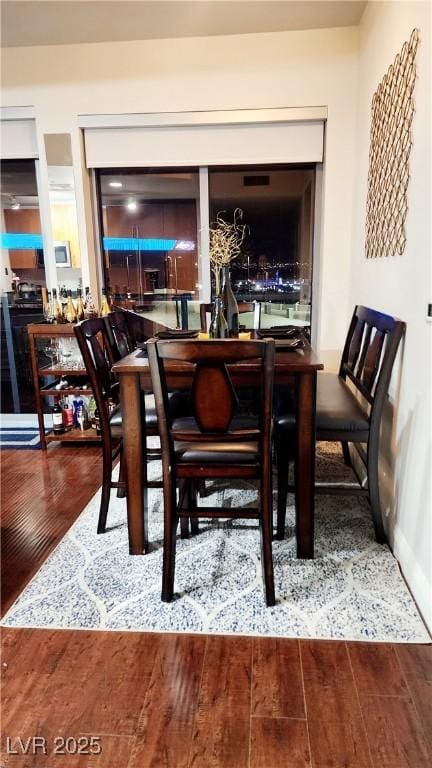 dining area featuring wood finished floors