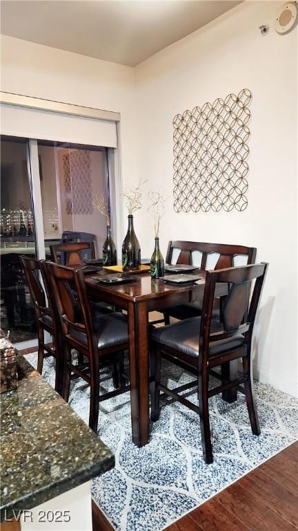 dining area featuring wood finished floors