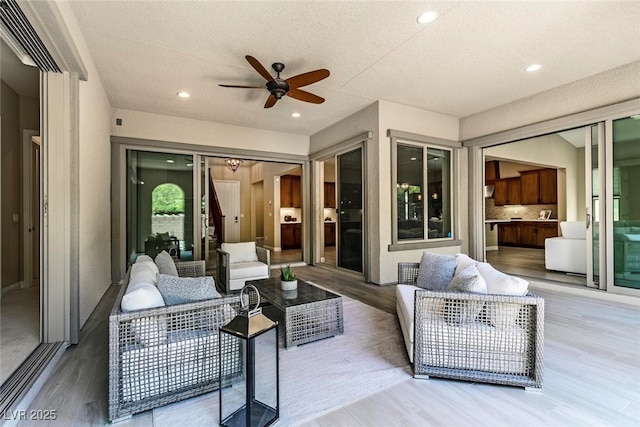 view of patio / terrace featuring ceiling fan and an outdoor hangout area