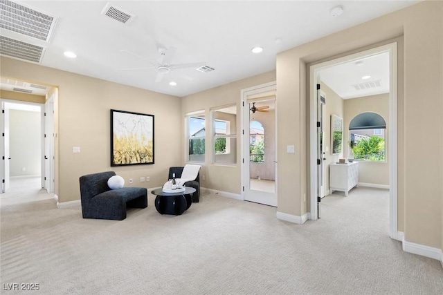 living area with a ceiling fan, carpet, visible vents, and recessed lighting