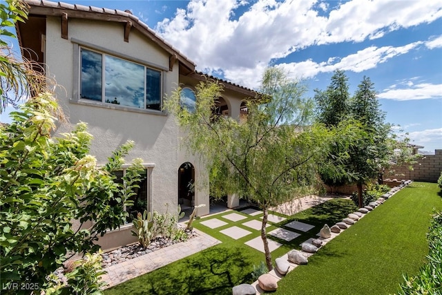 view of yard with a patio area and fence