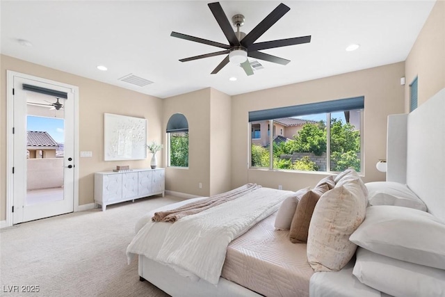 bedroom featuring light carpet, multiple windows, visible vents, and recessed lighting