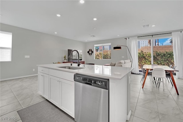 kitchen with visible vents, recessed lighting, a sink, light countertops, and stainless steel dishwasher