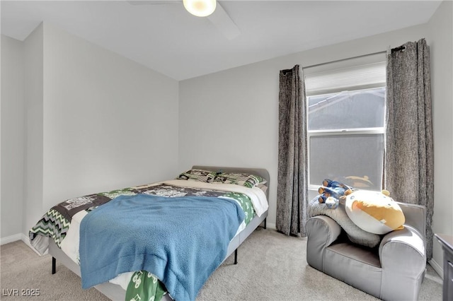 bedroom with baseboards, ceiling fan, and carpet floors