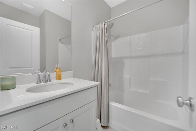 full bath featuring shower / bath combo with shower curtain and vanity