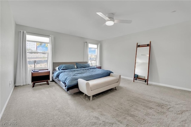 bedroom featuring carpet flooring, baseboards, and ceiling fan