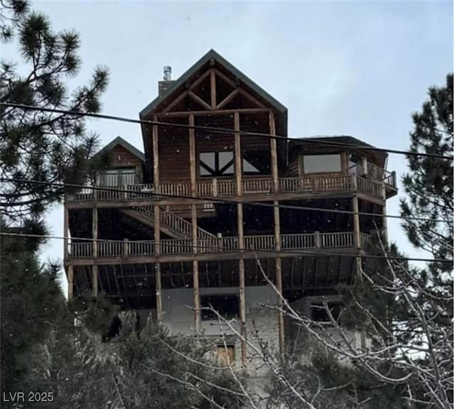 back of property featuring a chimney