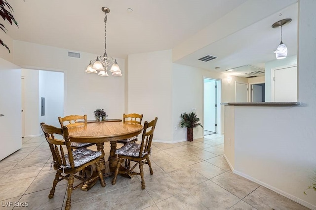 dining room with visible vents, baseboards, and light tile patterned flooring