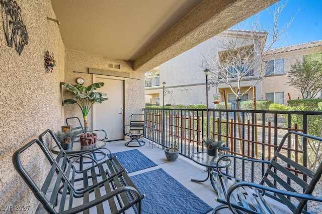 balcony featuring visible vents