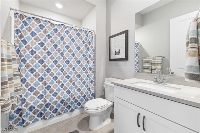 full bath with tile patterned flooring, a shower with curtain, vanity, and toilet