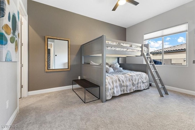 bedroom featuring carpet floors, baseboards, and a ceiling fan