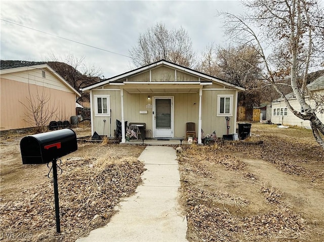 bungalow-style house with a porch