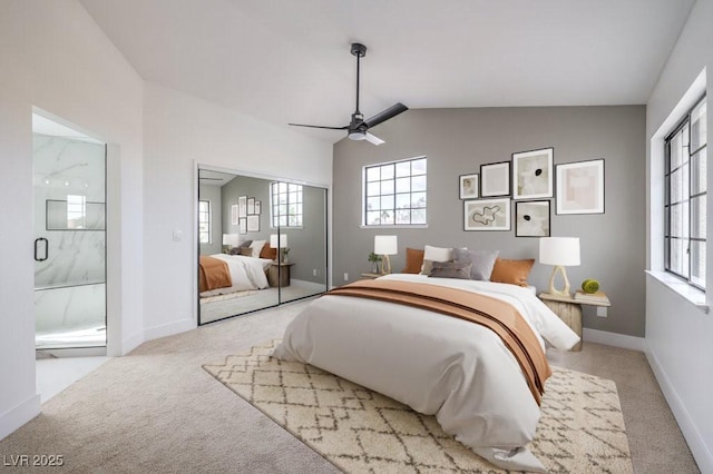 bedroom featuring lofted ceiling, multiple windows, carpet, and baseboards