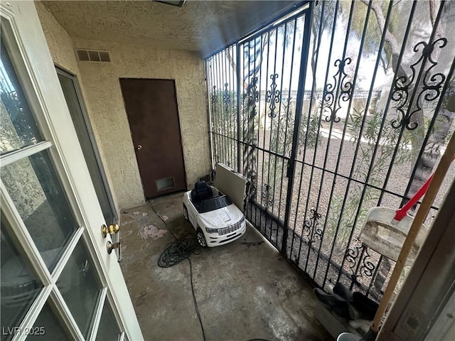 balcony featuring visible vents