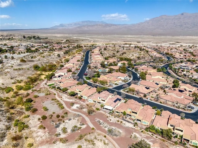 drone / aerial view featuring a mountain view and a residential view