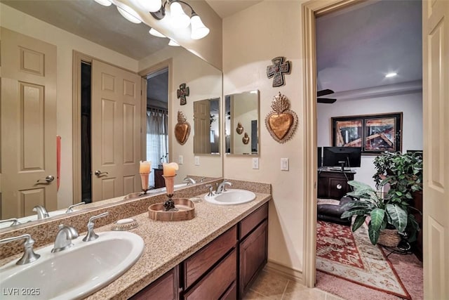 full bath with tile patterned flooring, a sink, and double vanity